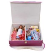 Three Pippa dolls, clothing, accessories and carry case