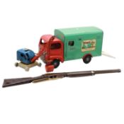 Box of assorted vintage toys, including Triang Horse Transporter