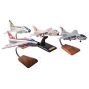 Four scale model military jet aircraft