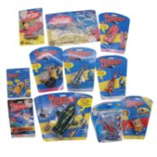 Eleven Gerry Anderson card-backed toys