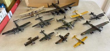Ten kit built model aircraft, with a collection of WW2 figures and other accessories