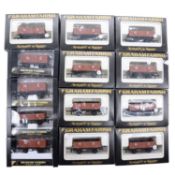 Thirteen Graham Farish OO gauge wagons, boxed