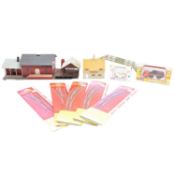 Five packets of Hornby OO gauge curved points, and small quantity of trackside buildings