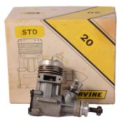 Irvine 20 engine, with muffler and spares, boxed,