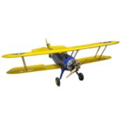 A scale model of Boeing-Stearman Model 75 biplane, fitted with engine.