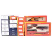 Seventeen Hornby and Bachmann OO gauge wagons and coaches, boxed