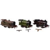 Hornby, O gauge model railway clockwork locomotive, and a Bing Locomotive