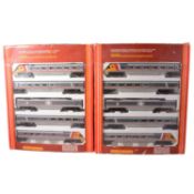 Two Hornby OO gauge Advanced Passenger Train packs,