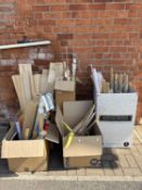 The contents of a modeller's workshop: building materials and plans