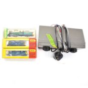 Three Minitrix N gauge locomotives, with H and M control unit