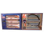 Two Lima Golden Series HO gauge train packs,