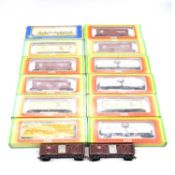Fourteen AHM HO gauge wagons