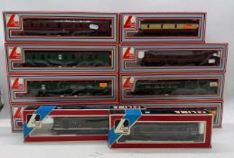 Lima, two OO gauge diesel locomotives, and a quantity of assorted rolling stock