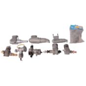 Five model engines and four mufflers,