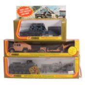 Three Corgi die-cast model vehicles