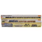 Three Hornby OO gauge model railway train packs,
