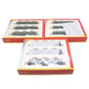 Three Hornby OO gauge model railway train packs,