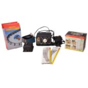 Collection of OO gauge track, trackside buildings and control units,