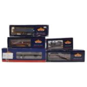 Two Bachmann Branch-Line OO gauge locomotives and three coaches,