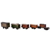 Six various O gauge scale model railway rolling stock, and track