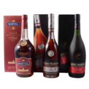 Two bottlings of Remy Martin VSOP Cognac, and a Martell VSOP Medaillon