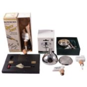 Two wine funnels, wine thermometer, and quantity of pouring stoppers