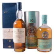 Two bottles of single malt Islay whisky