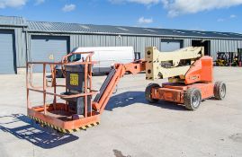 JLG M450AJ battery electric/diesel articulated boom access platform Year: 2002 S/N: 153609
