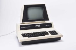A Commodore Model 3032 computer, with printer, disk drive and accessories