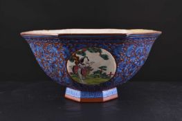 A Chinese enamelled Yixing pottery octagonal bowl, late Qing Dynasty