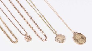A collection of gold and yellow metal jewellery