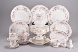 A collection of Paragon Victoriana Rose pattern dinner and tea/coffee wares