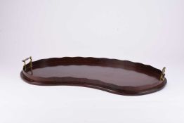 An Edwardian inlaid mahogany kidney form tray