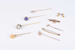 A small collection of pins/brooches