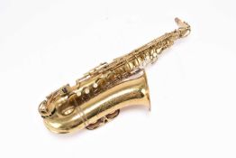 A Revelle Italian saxophone, with two cases, stand and accessories