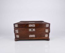 A Victorian rosewood tea caddy