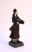 After Meier, a bronze and ivory figure of a rustic maiden