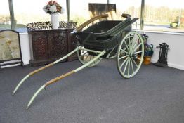 A horse-drawn governess cart, early 20th century