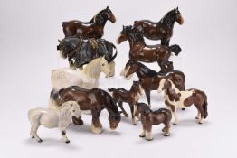 A group of Beswick and other horses