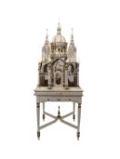 A Sacre Coeur birdcage with taxidermy bird specimens