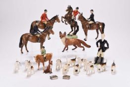 A Beswick hunting set including riders, foxes and hounds