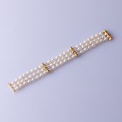 3-reihiges Süßwasser-Perlenarmband, Schließe und 2 Goldelemente mit kleinen Diamanten, 750er Gold
