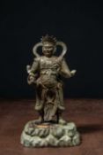 A BRONZE FIGURE OF VIRŪPAKA, GUARDIAN KING OF THE WEST CHINA MING DYNASTY