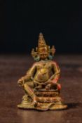 A SEATED BRONZE GILT JAMBHALA TIBET 13TH CENTURY STYLE BUT LATER