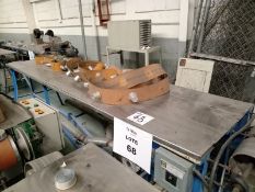 Table with bands for preforming