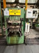 Molding press, capacity 165 tons.