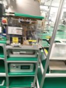 Automatic coil tin applicator