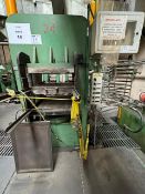 Molding press, capacity 165 tons.