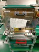 Automatic coil tin applicator