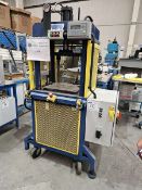 Hydraulic press for arrow and cam assembly